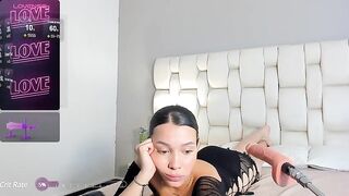 Emmelyx - Young girl sucks rubber cock and lies on the bed teasing in front of the camera