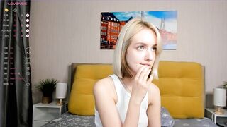 SunnivaGrindle - Young babe sweetly chatting and teasing in front of the camera with her clothes on