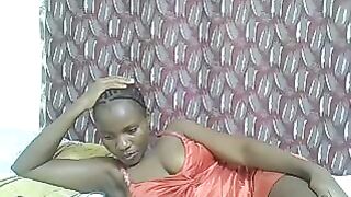 Pierra77 - Negro girl lies on the bed in a dress and does not want to undress