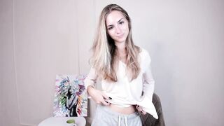 AraDunnuck - Adorable young babe teasing in front of the camera paws her small tits