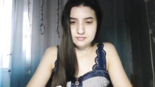 MilanesaGold28 -  Young babe sweetly chatting and teasing in front of the camera with her clothes on