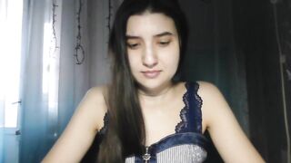 MilanesaGold28 -  Young babe sweetly chatting and teasing in front of the camera with her clothes on