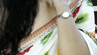 SexyRashmika - [Indian girl sweetly chatting and teasing in front of the camera with her clothes on.