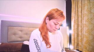 Mia_Peython - Red-haired milf in clothes teasing in front of the camera sweetly chatting