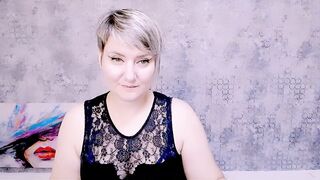 Djullia -  a mature maid smiles sweetly and chats in a chat room