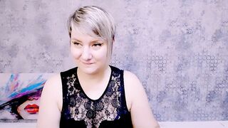 Djullia -  a mature maid smiles sweetly and chats in a chat room