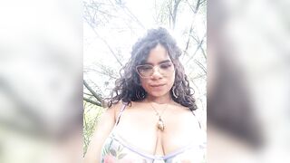 Simone_Miller - A curly-haired mulatto babe dances on the street in front of the camera.