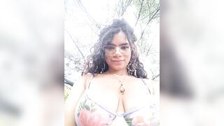 Simone_Miller - A curly-haired mulatto babe dances on the street in front of the camera.