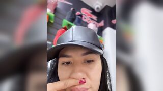 kim_monti - A lush young woman filming herself in a convenience store