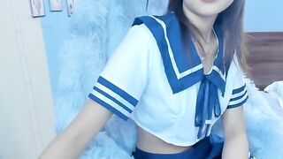 OLIVIA_BABEnew -  Charming little girl in a schoolgirl costume sweetly chats and teases in front of the camera