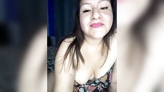 kali_lopez - A cute girl with clothes on sits chatting and teasing in front of the camera.