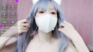 Ruby_2xy - Young Asian girl with blue hair communicating and teasing in front of the camera