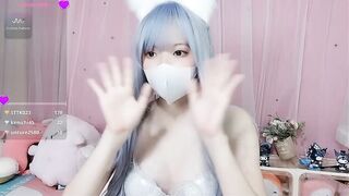 Ruby_2xy - Young Asian girl with blue hair communicating and teasing in front of the camera