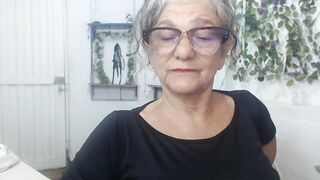 FunnyGrandma - Milfa in age sweetly chatting and teasing in front of camera and sweetly chatting