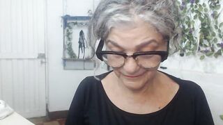 FunnyGrandma - Milfa in age sweetly chatting and teasing in front of camera and sweetly chatting