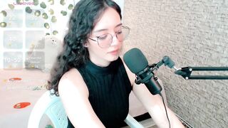 emma_unu -Curly-haired brunette in glasses sucks a rubber cock down her throat and imagines that it's real.