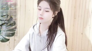 Qedgjwyz1 - Young Asian girl shy to undress in front of the camera.