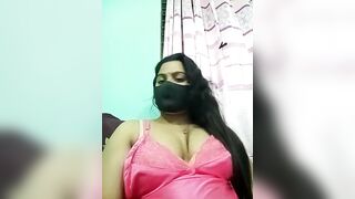 Amisha-2 - Indian girl in a negligee sits chatting with a chat room