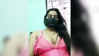 Amisha-2 - Indian girl in a negligee sits chatting with a chat room