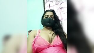 Amisha-2 - Indian girl in a negligee sits chatting with a chat room