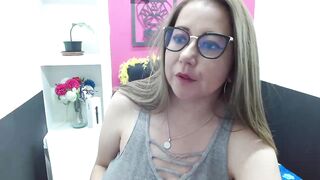 big_tits_horny - A lush milfochka squirms in her clothes in front of the camera.