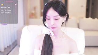 JayPope - Charming Asian girl is shy to undress in front of the camera.