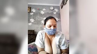 Kavya_kapoor -Indian girl sweet-talking and teasing her big tits in front of the camera.