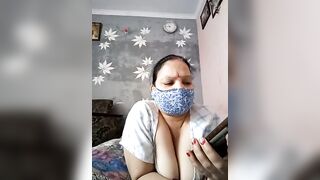 Kavya_kapoor -Indian girl sweet-talking and teasing her big tits in front of the camera.