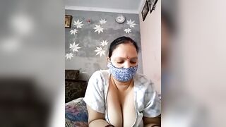 Kavya_kapoor -Indian girl sweet-talking and teasing her big tits in front of the camera.