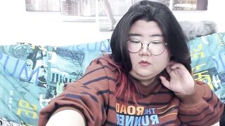 Nadine_asian - busty young woman with big tits sweetly chats and teases in front of the camera