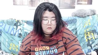 Nadine_asian - busty young woman with big tits sweetly chats and teases in front of the camera