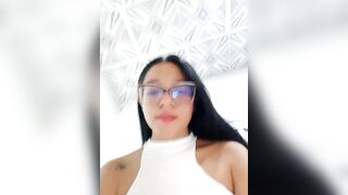 -VICKKY - Young mulatto chats sweetly and teases in front of the camera