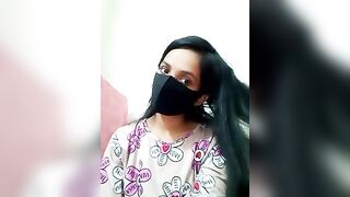 PujaRay- -  Latina in clothes teases in front of the camera and chats sweetly with the chat