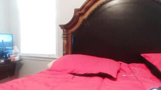 ebonyred - Busty milf in clothes on bed teasing for camera
