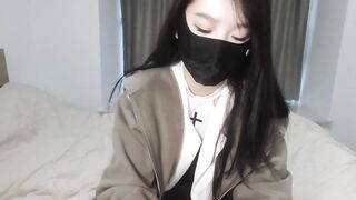 NIKi---6688 - young Asian girl sweetly chatting and teasing in front of the camera