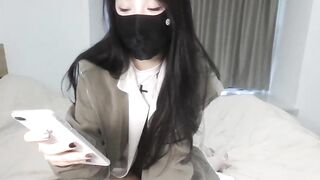 NIKi---6688 - young Asian girl sweetly chatting and teasing in front of the camera