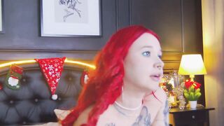 VeronicaLane - A babe with red hair in tattoos dances in front of the camera and chats sweetly with the chat room