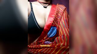 muskan69 -  Boobed Indian woman paws her big boobs on camera in a bra