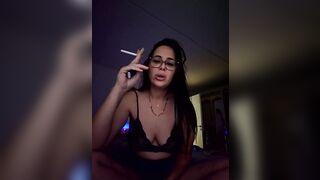 Liilii22 - Brunette with small tits poses on the bed in front of the camera and sweetly chatting with the chat room